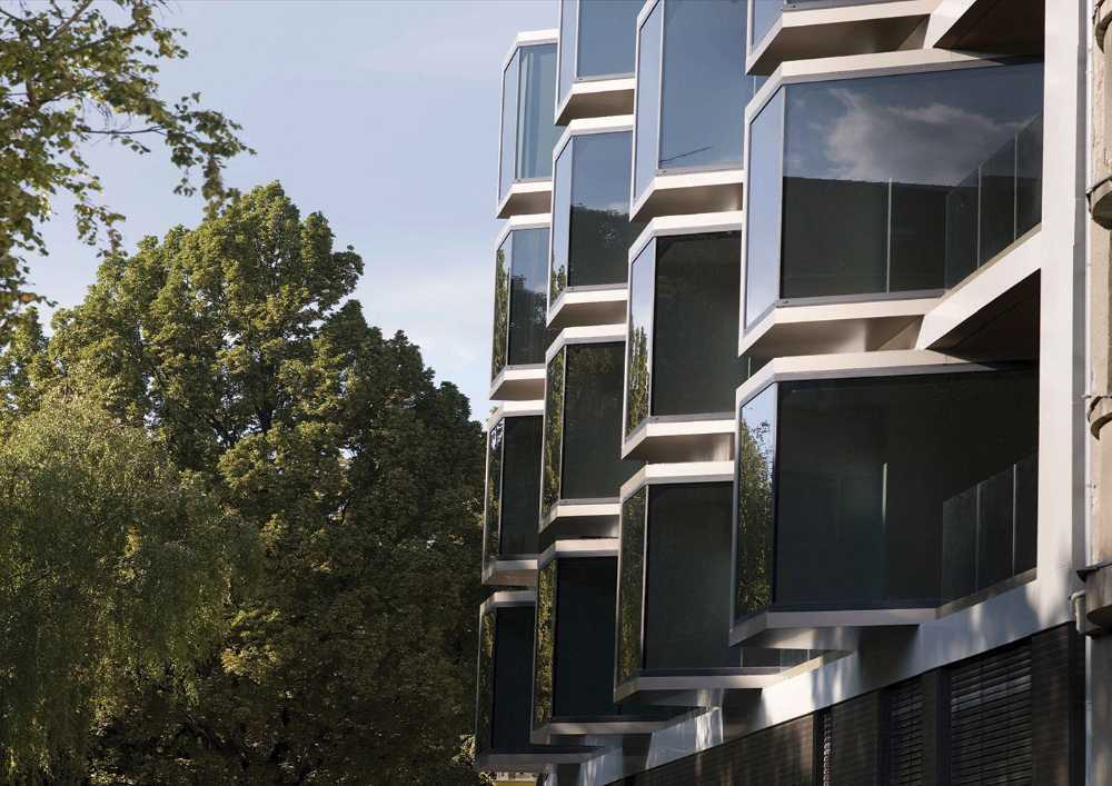 Tridimensionalidad y juego de volúmenes en la fachada. Edificio residencial Interpolation B