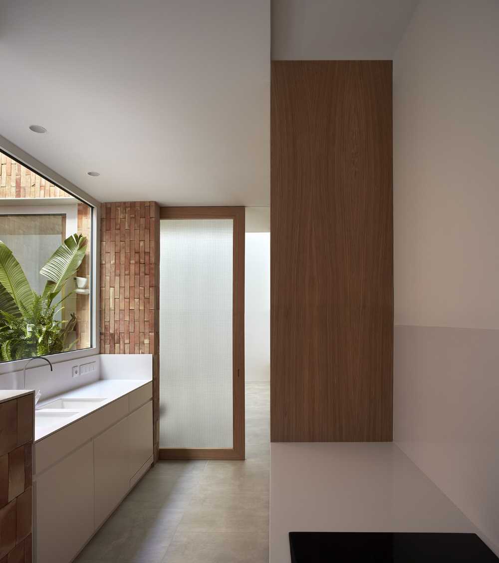 AM House. Some old facade that conceals a residential revival