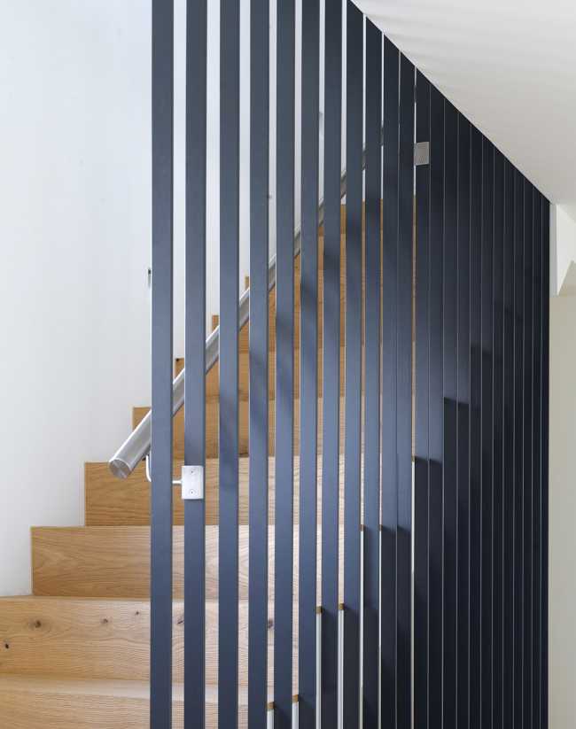 SWISSHOUSE XXXVI is located near Basel. Concrete sheets are pointing toward an unexpected experience of space