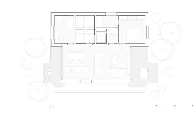 House for two families in Lucerne. A rigorous floating structure attenuated by playful openings