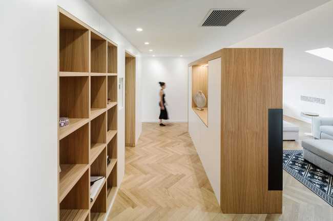 Fusion of three attics for the realization of Casa AA: a transmuted space, wide, modern and elegant