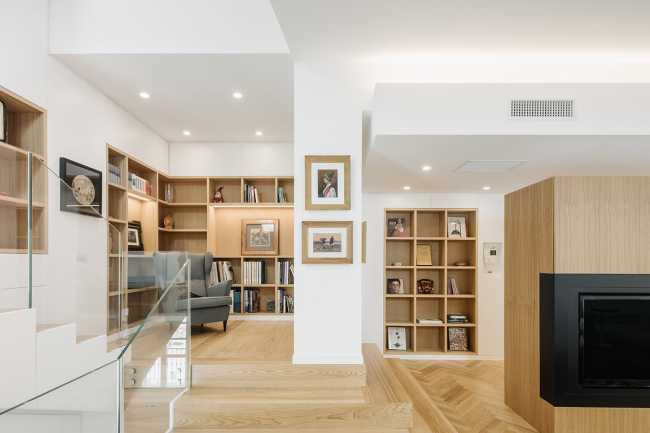 Fusion of three attics for the realization of Casa AA: a transmuted space, wide, modern and elegant