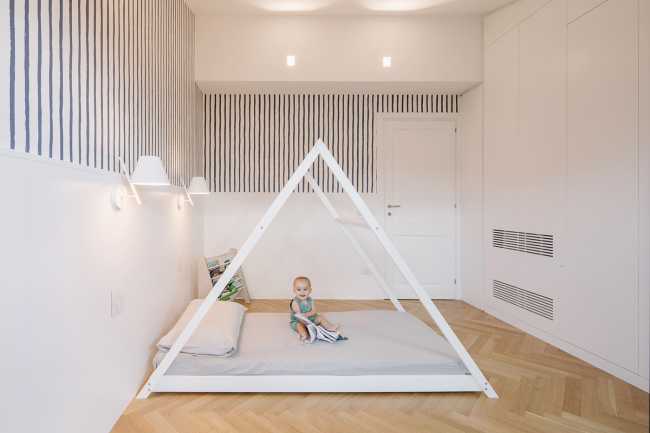 Fusion of three attics for the realization of Casa AA: a transmuted space, wide, modern and elegant