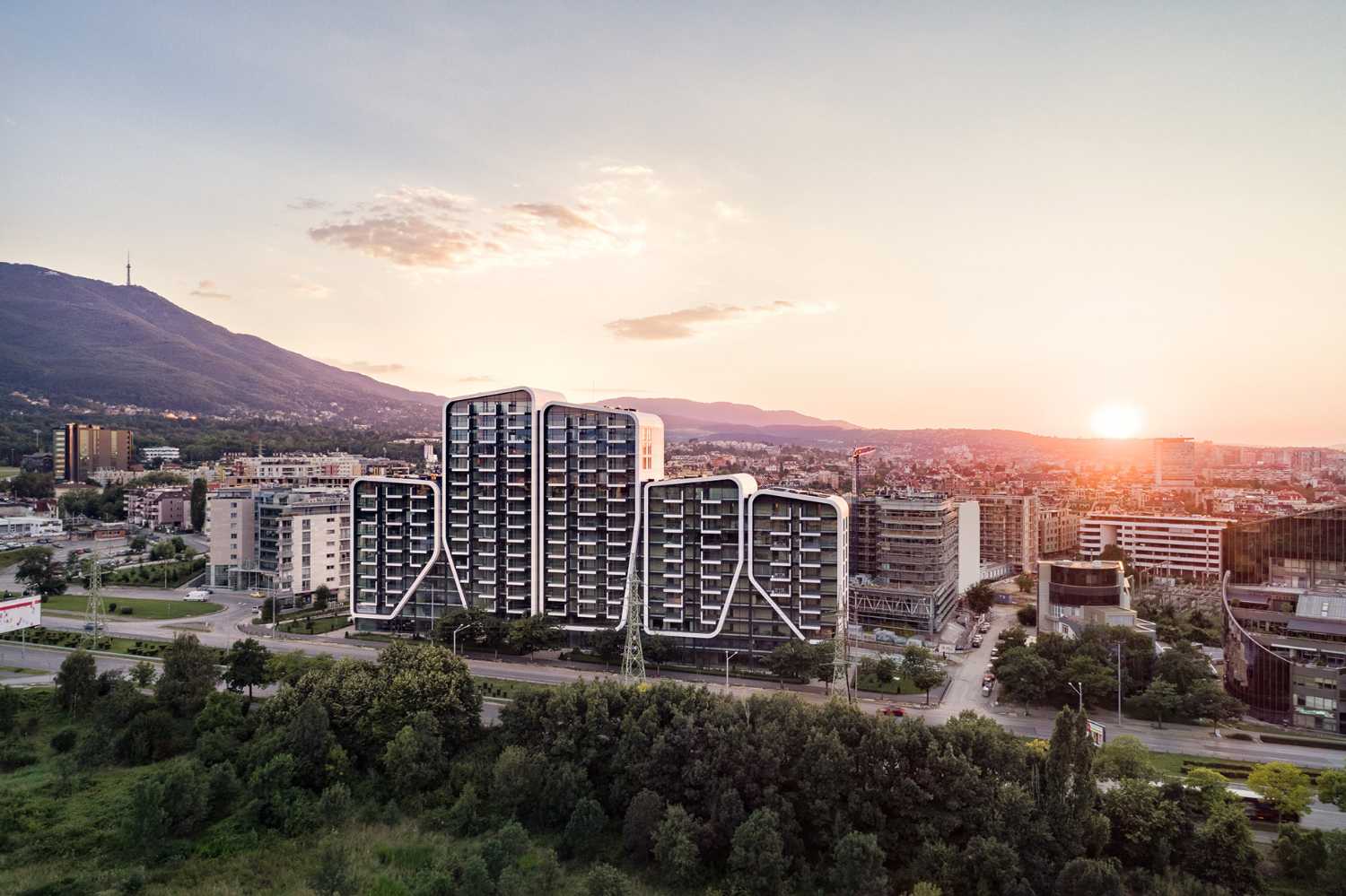 Linee e forme morbide degli A3 - Advanced Architecture Apartments. Dove città e montagna traboccano l’una nell’altra