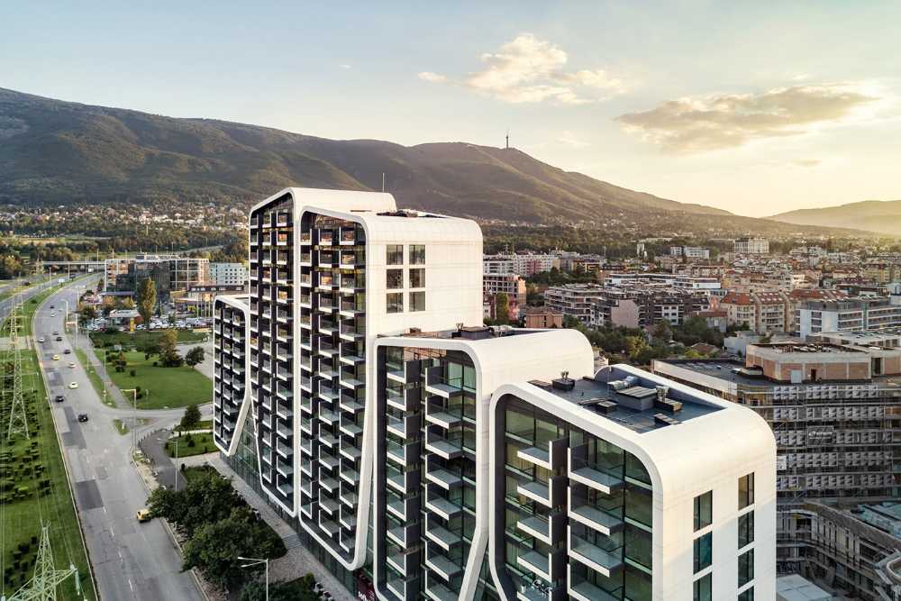 Linee e forme morbide degli A3 - Advanced Architecture Apartments. Dove città e montagna traboccano l’una nell’altra