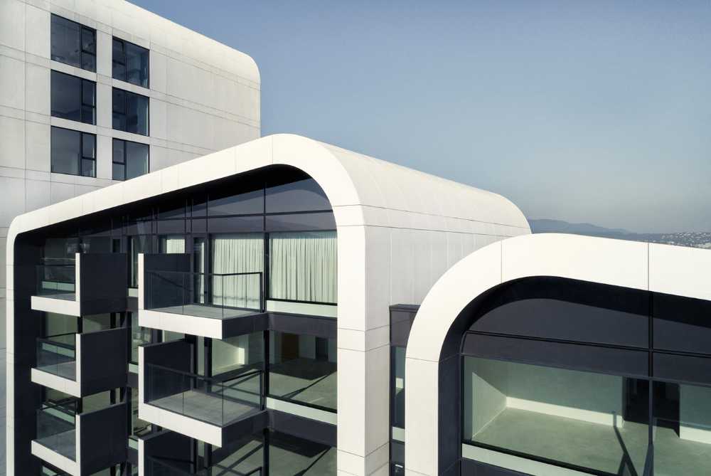 Linee e forme morbide degli A3 - Advanced Architecture Apartments. Dove città e montagna traboccano l’una nell’altra
