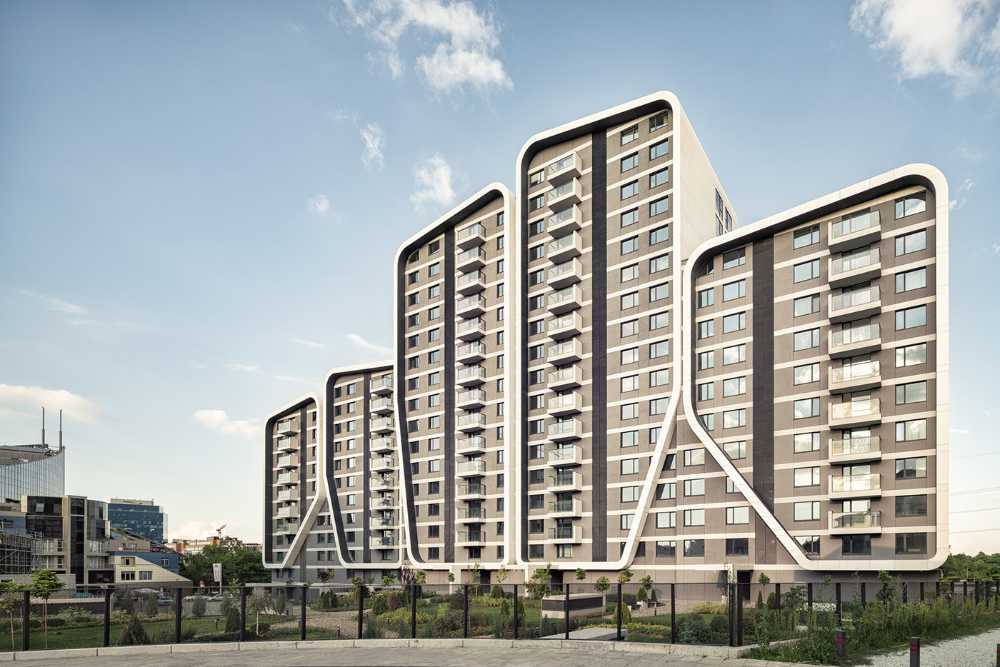 Linee e forme morbide degli A3 - Advanced Architecture Apartments. Dove città e montagna traboccano l’una nell’altra