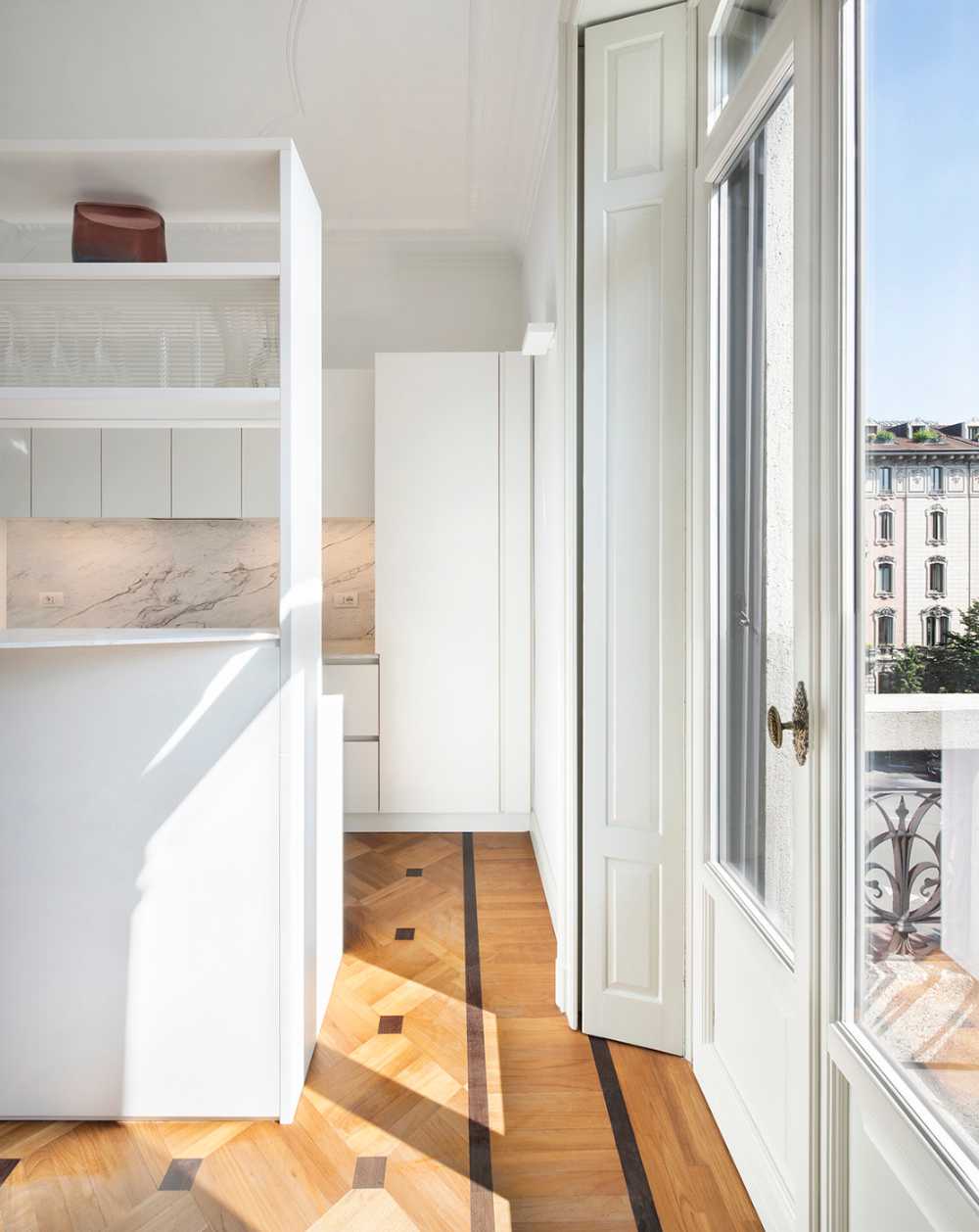 Appartamento in via Saffi a Milano: giustappostizione di nuovi volumi ad elementi storici