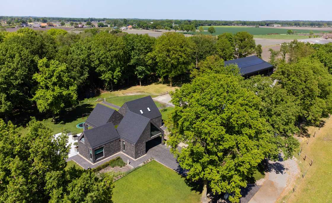 Nestled in the lap of an ancient medieval agricultural area, the former site of an automobile company transforms into a