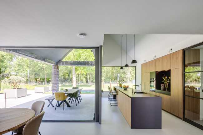 Nestled in the lap of an ancient medieval agricultural area, the former site of an automobile company transforms into a