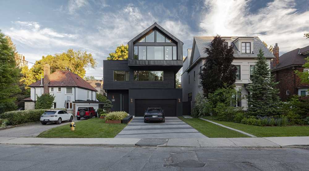 The stacked volumes, reminiscent of a column of books, of the Stack House in Toronto