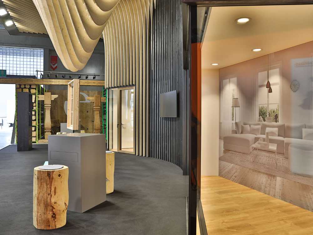 Exhibit design project Suspended Folds. A trade show booth conceived reflecting on the malleability of wood