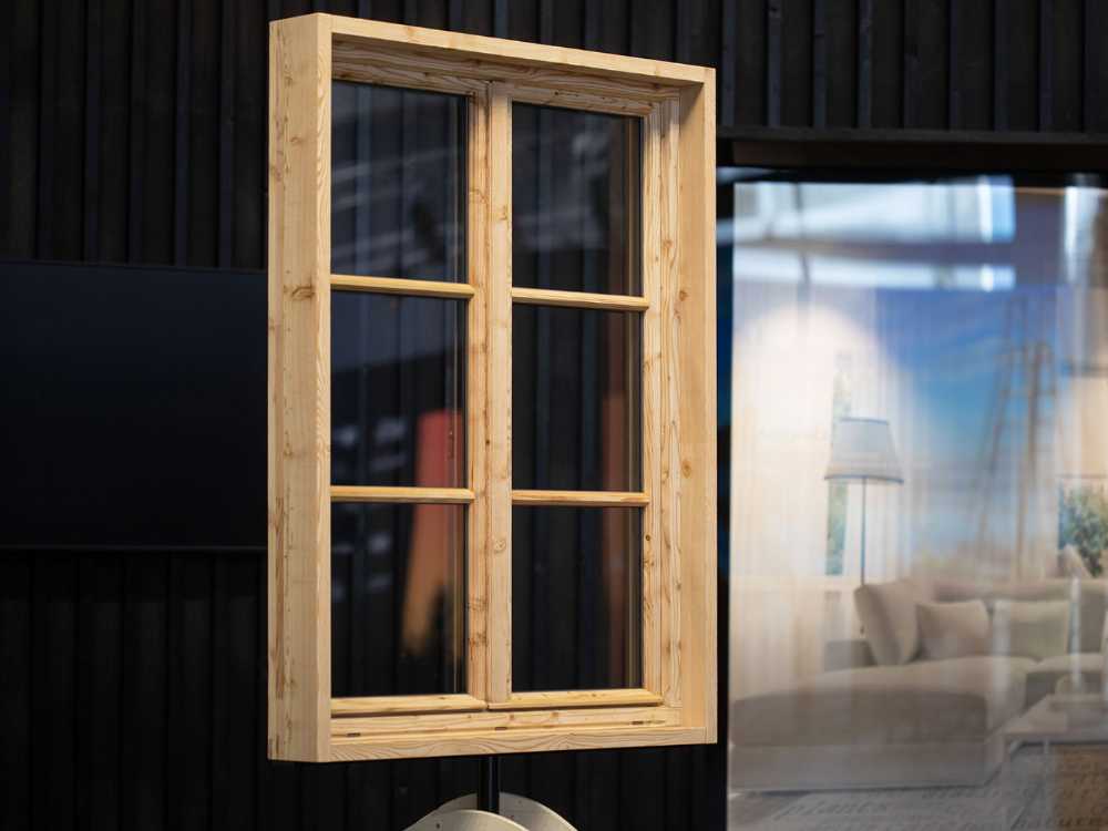 Exhibit design project Suspended Folds. A trade show booth conceived reflecting on the malleability of wood