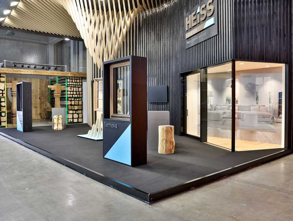 Exhibit design project Suspended Folds. A trade show booth conceived reflecting on the malleability of wood