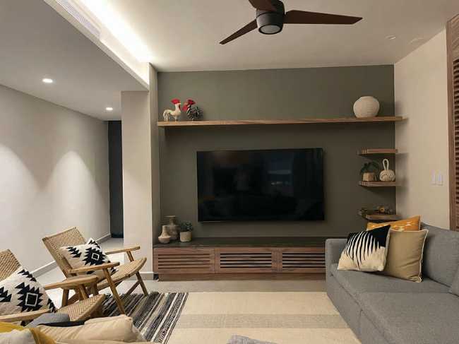 Ampi spazi e atmosfera ammorbidita dai materiali a Casa PC145 nei Caraibi