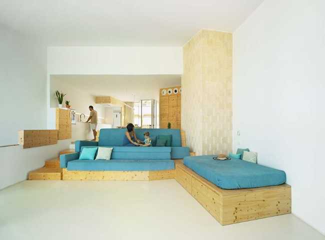 Home-studio in a fisherman's district built with locally-sourced stone. Against architectural banality and the loss of traditions