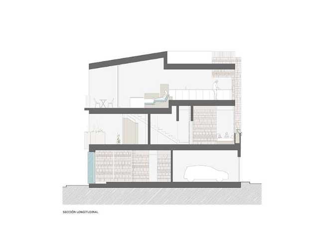 Home-studio in a fisherman's district built with locally-sourced stone. Against architectural banality and the loss of traditions