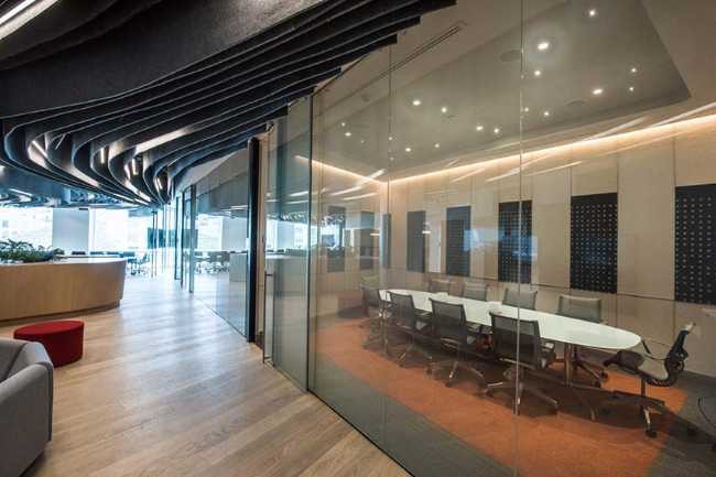 Oficinas de Cushman & Wakefield en Ciudad de México. Un mar de diseño en un interior fluido y dinámico