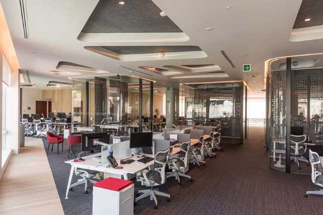 Oficinas de Cushman & Wakefield en Ciudad de México. Un mar de diseño en un interior fluido y dinámico