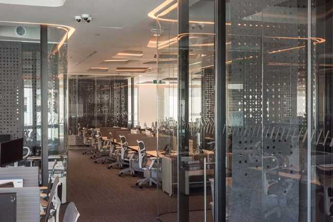 Oficinas de Cushman & Wakefield en Ciudad de México. Un mar de diseño en un interior fluido y dinámico