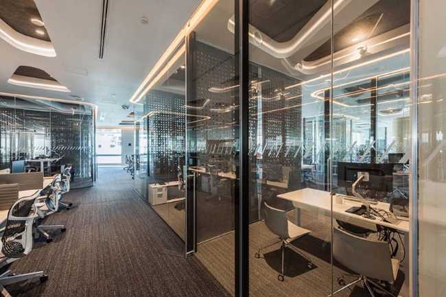 Oficinas de Cushman & Wakefield en Ciudad de México. Un mar de diseño en un interior fluido y dinámico