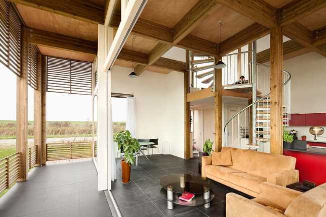 Daylighthouse 2. A wooden and glass cube bathed in light