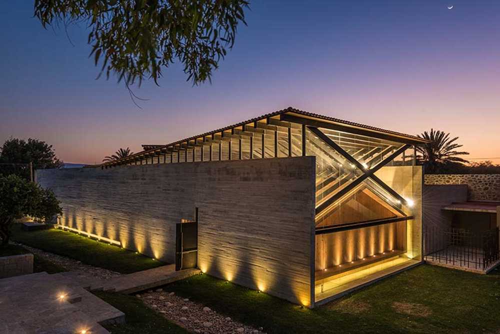 RLJ Chapel. Exposed Concrete and Steel Contrasting with Natural Materials