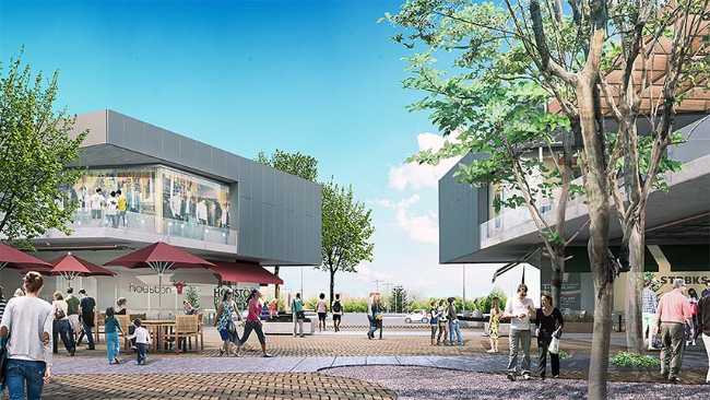 Volumes and materials that dialogue with the urban fabric for the Nuevo Quilmes Plaza Shopping Center