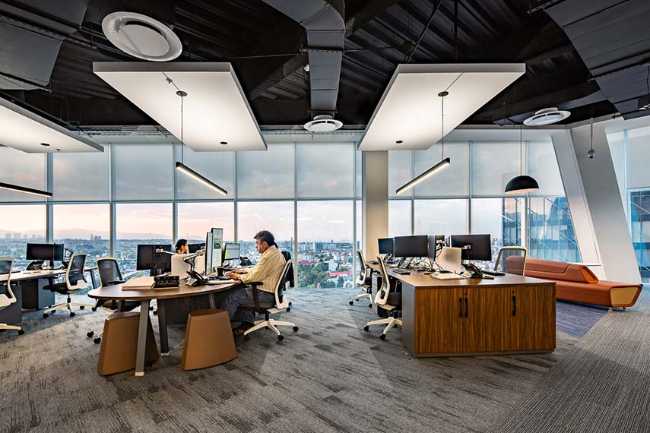 Corporate interior design for the right balance between transparency and privacy in the new Charles Taylor offices