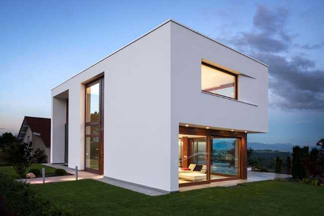 Panorama avec vue sur le lac et confort résidentiel à faible impact environnemental de la Elle Maison en Suisse