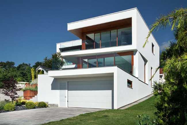 Panorama avec vue sur le lac et confort résidentiel à faible impact environnemental de la Elle Maison en Suisse