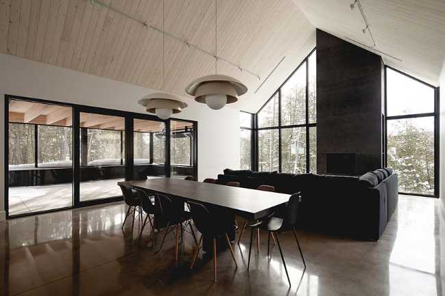 Varied volumetrics and local materials of the La Tierce residence for a living experience intimately linked with nature