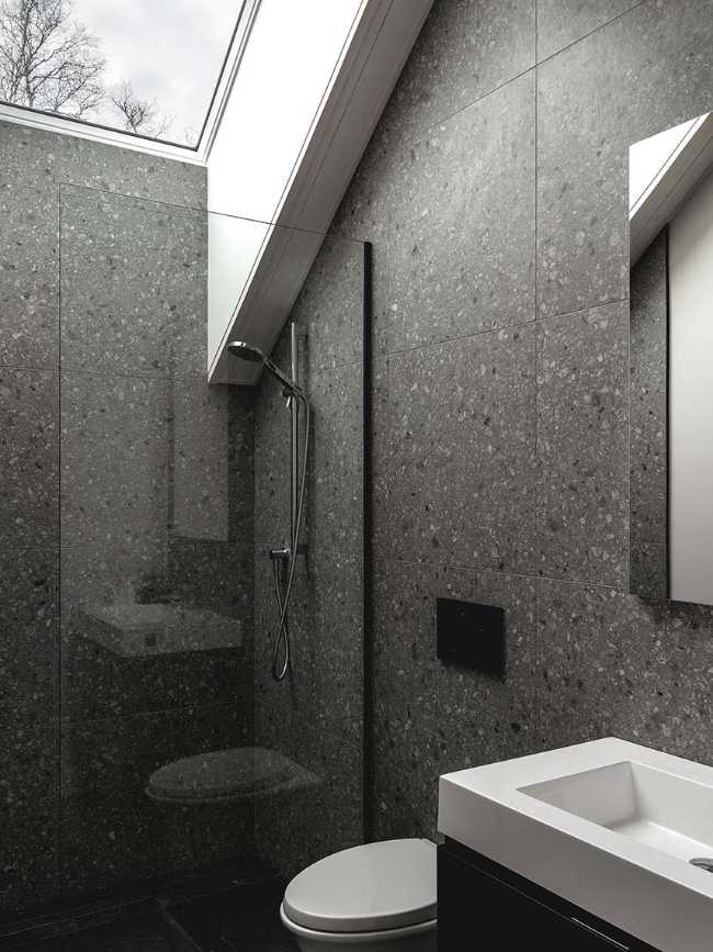 Varied volumetrics and local materials of the La Tierce residence for a living experience intimately linked with nature