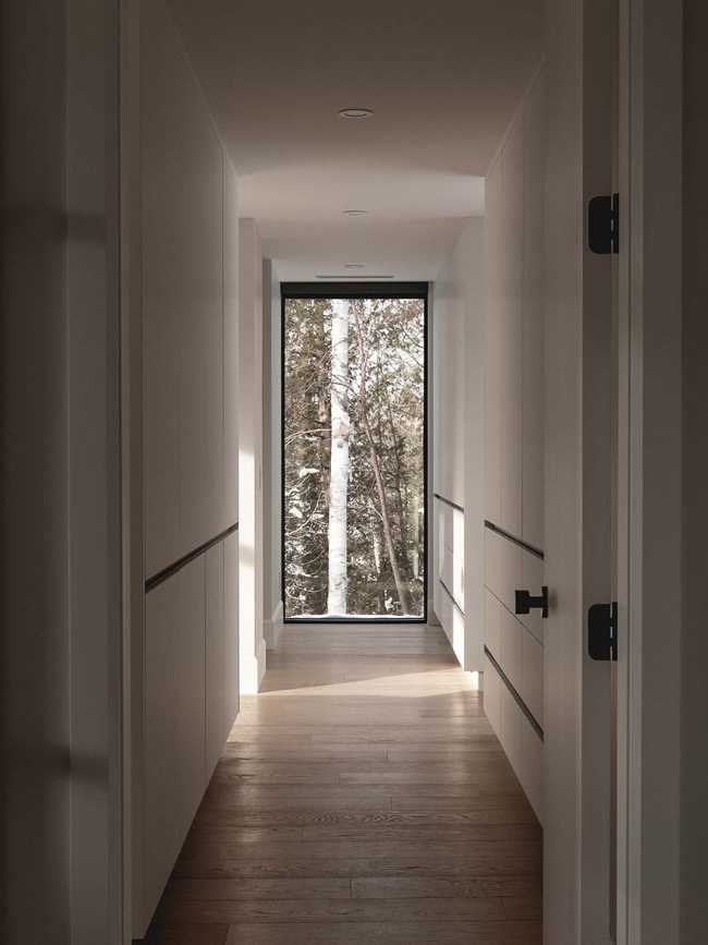 Varied volumetrics and local materials of the La Tierce residence for a living experience intimately linked with nature