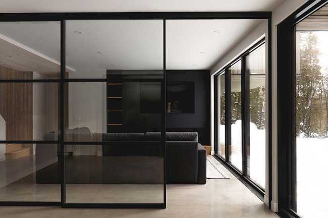 Varied volumetrics and local materials of the La Tierce residence for a living experience intimately linked with nature