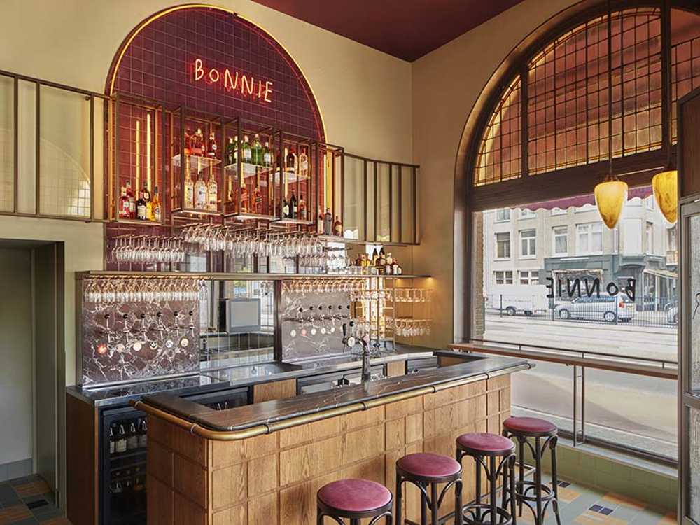 Bonnie bar-bistro design celebrates the hospitality of old cafes in Amsterdam, amid drinks and stories