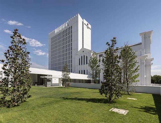 Hotel NH Collection Milano CityLife. Soluzioni Saint-Gobain Italia per un edificio iconico