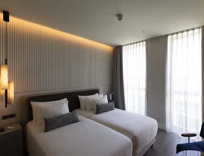 Hotel NH Collection Milano CityLife. Soluzioni Saint-Gobain Italia per un edificio iconico