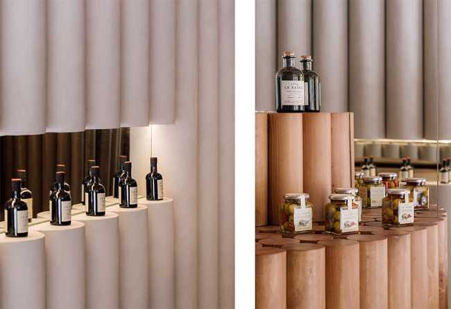 El espejo que completa. Círculos e ilusión óptica para el interior de la tienda de pimentón ahumado Humo