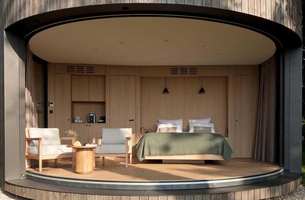 Revolutionizing hospitality with LumiPod. High-end suites encapsulated in autonomous cabins nestled in the landscape