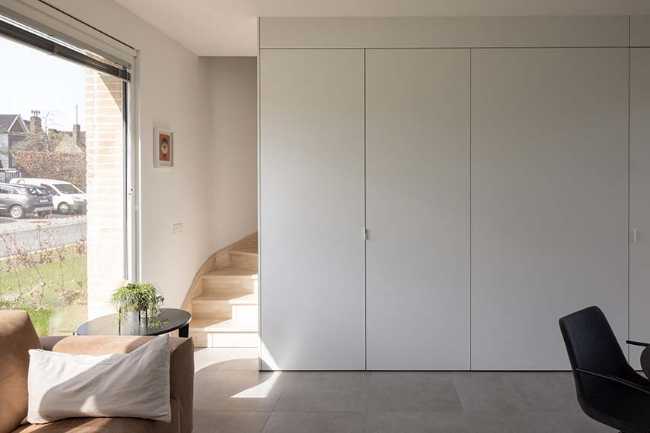 Ten Boomgaard. Seven new starter homes around a collective garden