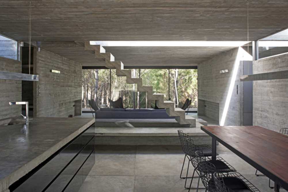 Architecture for architects at Casa L4. Exposed concrete and landscape