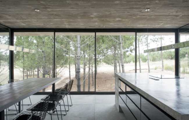 Architecture for architects at Casa L4. Exposed concrete and landscape