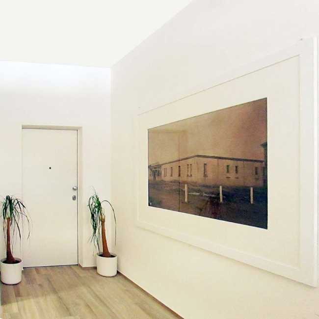 Recuperación del edificio en via Matteotti 189. Líneas puras y frescos