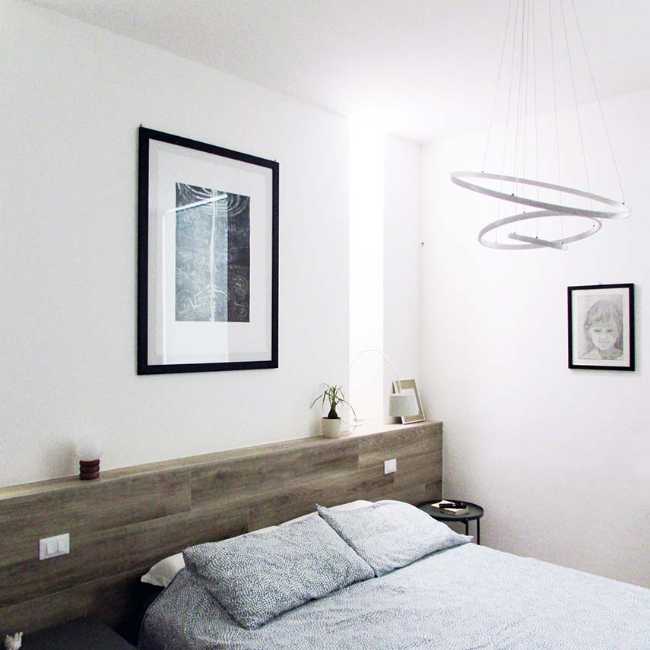 Recuperación del edificio en via Matteotti 189. Líneas puras y frescos