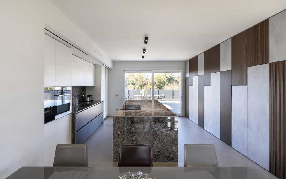 Attico NB rénovation: fusion du design avec le paysage