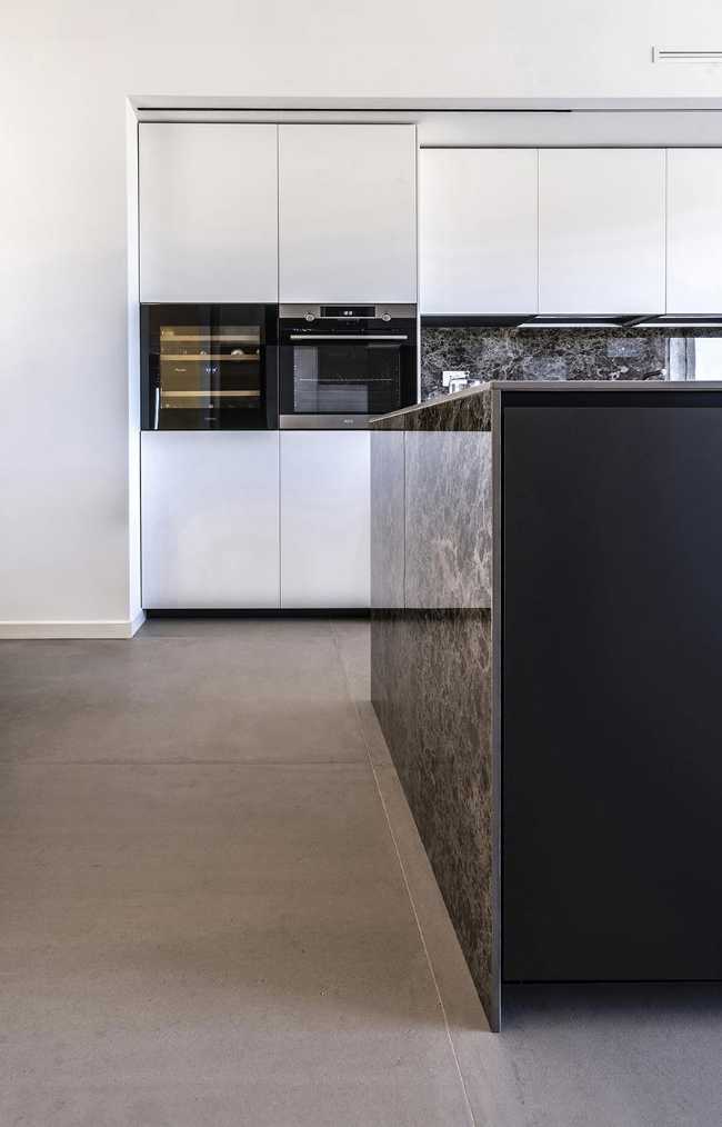 Ristrutturazione attico NB: unire design e paesaggio