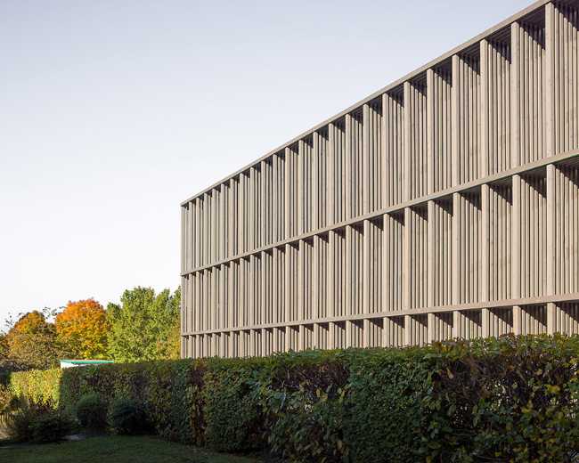 The ASSIA headquarters extension. Building structure in wood, concrete and glass