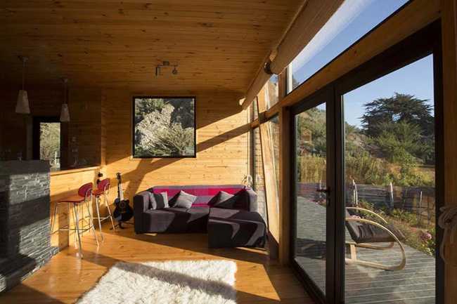 Casa Cubo eficiente en energía integrada con la naturaleza