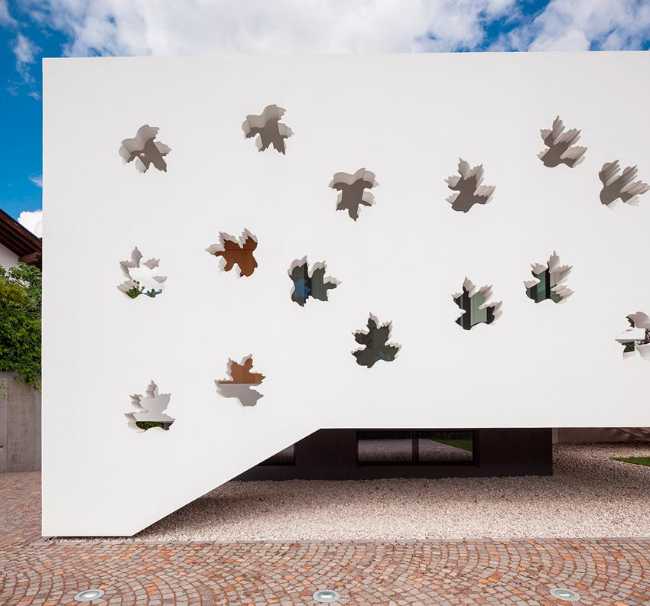 exterior cemento decoración hojas